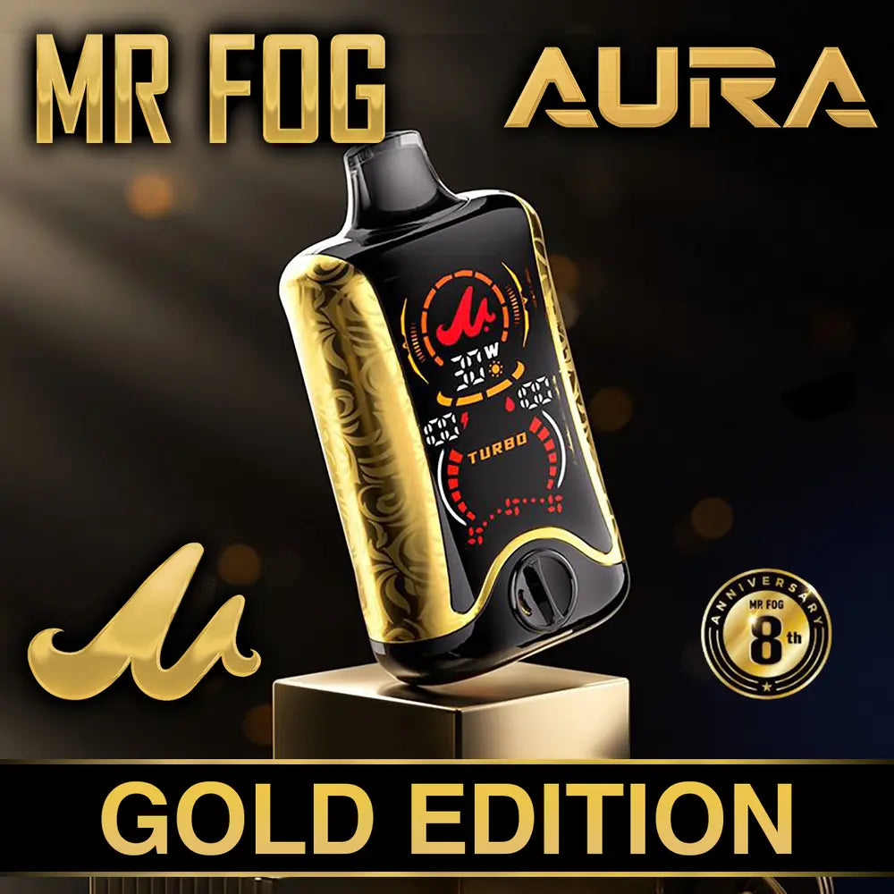 MR FOG AURA Gold Edition vape device on a dark background with branding.